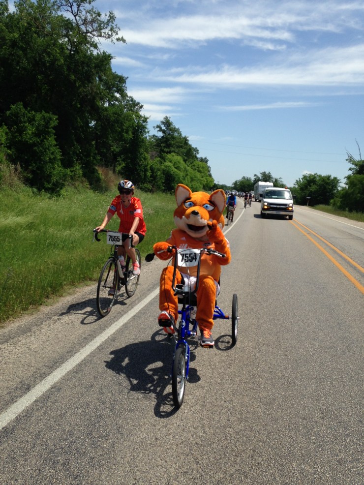 The mascot for the Houston Dynamo made the ride too! In fact the mascots for the Rockets and the Astros rode too. I don't know they do it without dying of heatstroke but, much respect for them!