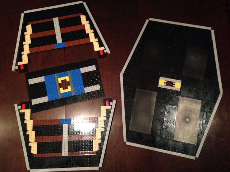 With one of the panels outside covering complete, here it is compared to the still in process second one.